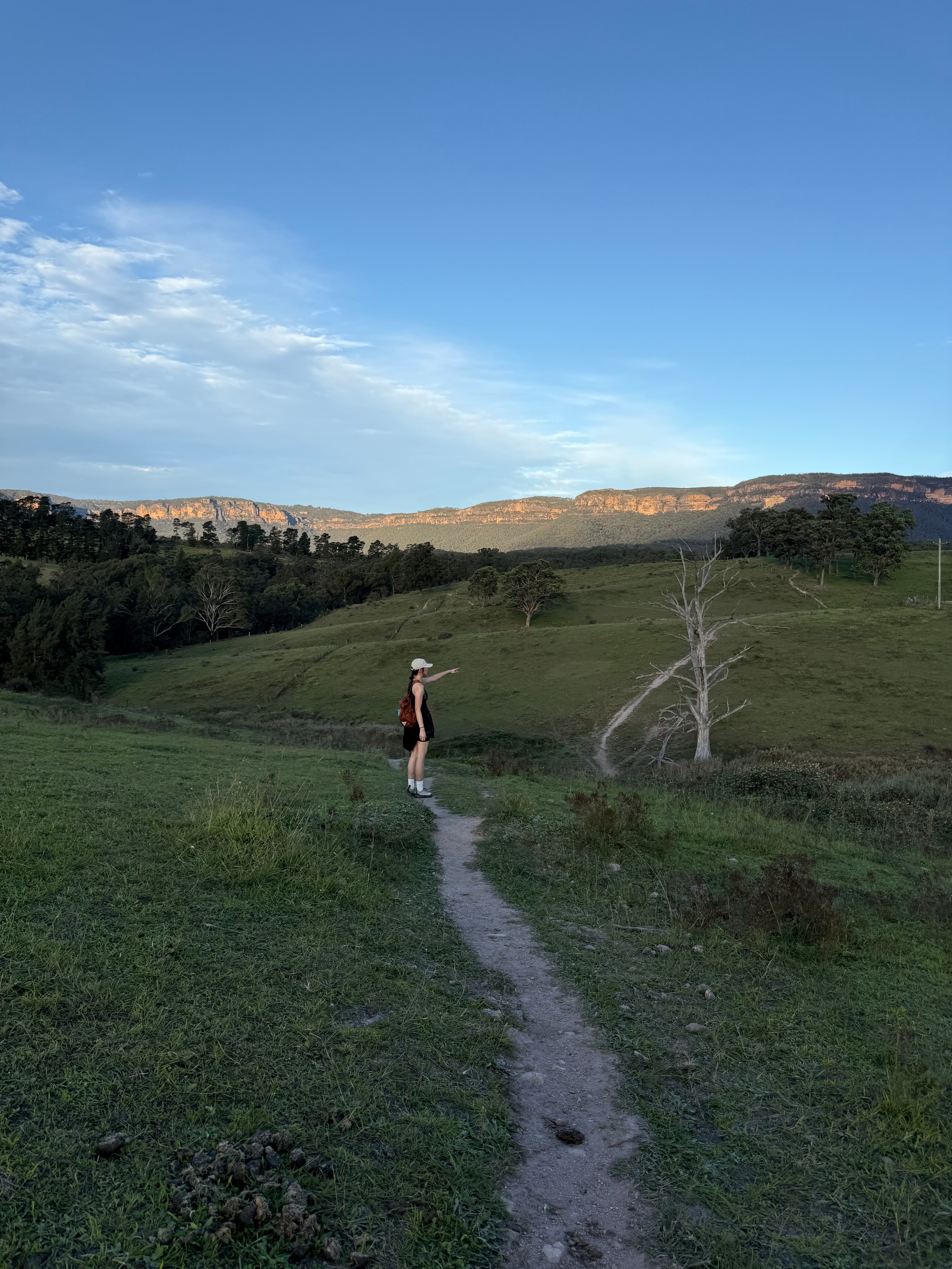 Eryou walking along a valley trail